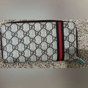 Gucci large wallet.